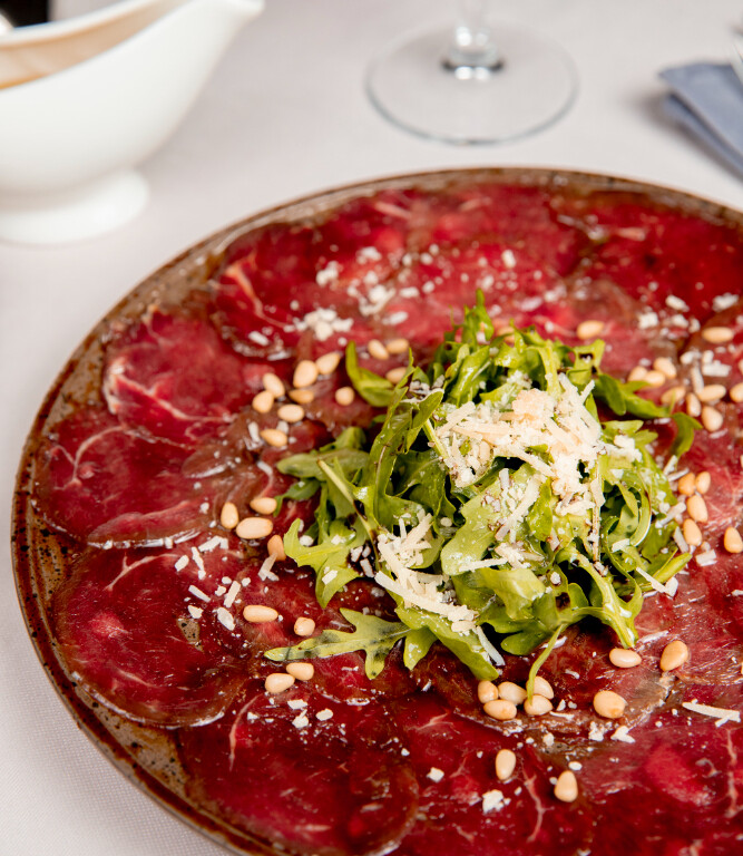 Beets carpaccio with blood oranges & cashew nuts plate
